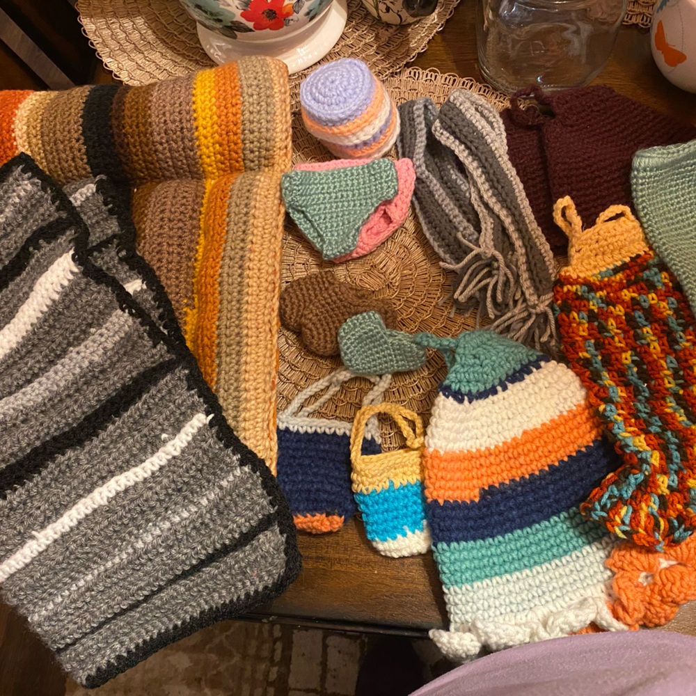 Homemade crocheted doll clothing and accessories